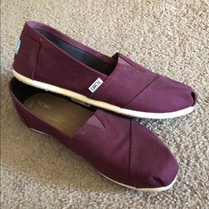 TOMS maroon shoes.